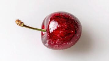 A cherry on a white background photo