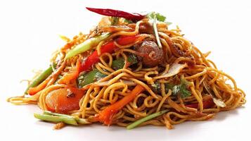 A pile of noodles with vegetables and meat photo