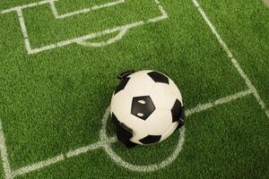 White markings on artificial turf. Playing football. photo