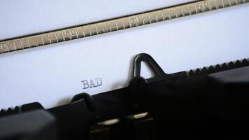 Typing the expression BAD NEWS with an old manual typewriter video