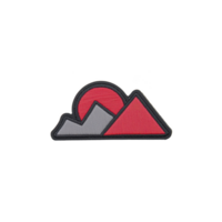 A vibrant patch design features stylized red and gray mountains with red sun, creating bold and modern outdoor theme. patch is outlined in black, adding contrast and definition png