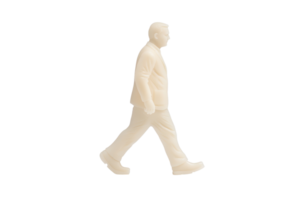 A beige plastic figurine of man in suit walking forward, isolated on transparency background. figure is in side profile, showcasing formal attire with neutral expression png