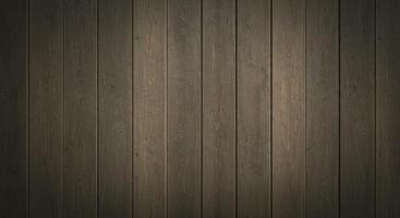 Close up of a wall featuring vertical sun bleached wooden planks. The worn texture shows subtle grain patterns and soft greyish brown tones. photo