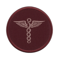 A maroon circular patch features embroidered caduceus symbol, representing medicine and healthcare. design is detailed with staff entwined by two serpents and topped with wings png