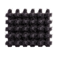A This shows textured, dark colored, interlocking foam mat with shaggy surface, often used for flooring play areas or gyms. mat has soft, plush appearance and is designed for comfort and safety png