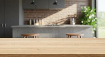 Wooden table in focus with a blurred kitchen background. Counter, stools, cabinets, brick wall, plant, and window are visible in the distance. photo