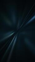 Dark futuristic vertical background with high speed light beams and particles converging into a tunnel-like vortex. Ideal for concepts related to hyperspace, speed, sci-fi or technology. video