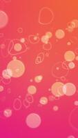 Shiny sphere particles and ring squiggles on warm orange red color gradient background. Full HD and looping vertical abstract animation. video