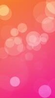 Fun vibrant bokeh background animation with gently flickering defocused bokeh light spheres on a warm pink orange color gradient. This cheerful vertical background is full HD and a seamless loop. video