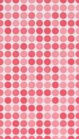 Cute polka dot pattern background in warm colors. Shiny button effect. Fun cheerful looping vertical animation. video