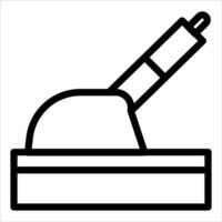 A black and white icon of a pen on a desk vector