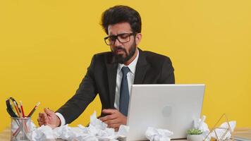 Angry furious man working at home office throwing crumpled paper, having nervous breakdown at work video
