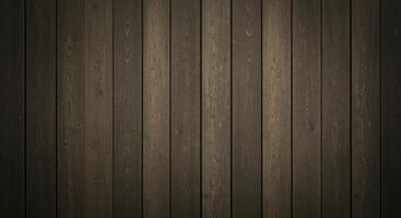 Close up of a wall made of vertical sun bleached wooden planks. The wood has a worn texture with subtle grain patterns and soft greyish brown tones. photo