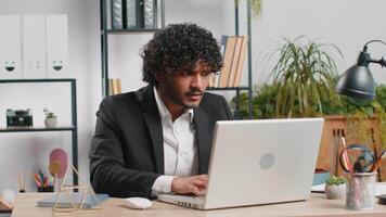 Irritated tired businessman working on laptop website problem, computer virus data loss by hacking video