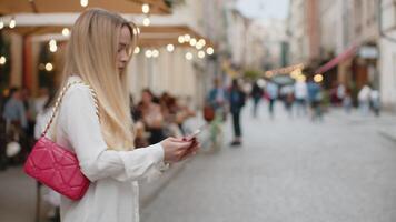 Tourist traveler woman girl using looking smartphone search a way on map in mobile navigator app video