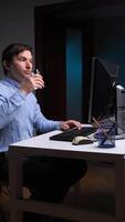 vertical Office worker spitting water on computer screen while drinking video
