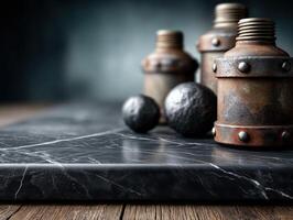 Rustic metal containers and spherical stone objects rest on a polished dark marble surface with visible white veins, placed on a weathered wooden table, with an atmospheric background photo