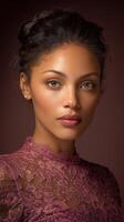 Elegant portrait of a woman with captivating eyes and softly styled dark hair. She wears a mauve lace high-neck top, complemented by a natural makeup look highlighting her features photo