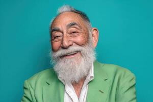 Elderly man with a white beard and mustache smiling warmly, wearing a green blazer over a white shirt, with bushy eyebrows and short hair, posing confidently on a neutral backdrop photo