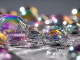 Colorful soap bubbles with iridescent surfaces reflecting light scatter on a smooth surface. The bokeh effect in the background creates a dreamy and whimsical atmosphere photo
