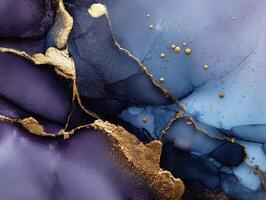 Abstract art piece with flowing purple and blue hues interspersed with metallic gold veins and splatters, creating a fluid, elegant pattern. No visible text or recognizable shapes photo
