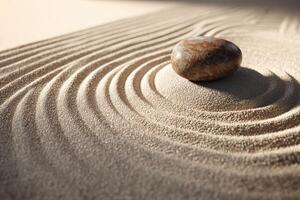 Smooth stone rests on finely raked sand creating harmonious patterns of concentric circles, evoking a sense of tranquility and balance, with light casting gentle shadows photo