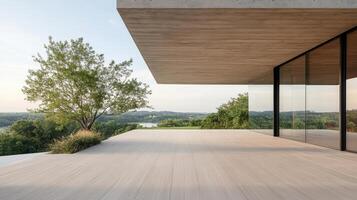 Modern house with large glass windows overlooking the valley photo
