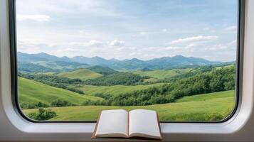 Book on the window of a train photo
