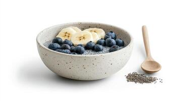 Chia bowl with blueberries and banana slices, perfect for healthy breakfast photo