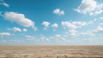 Vast open space with textured stone surface bright blue sky filled with fluffy clouds creates photo