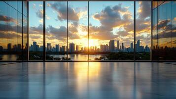 A large window looking out onto a city at sunset photo