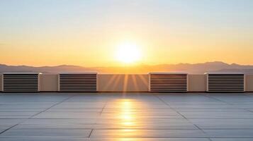 Air conditioning units on a rooftop at sunset photo