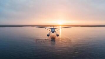 A seaplane is flying over the water at sunset photo