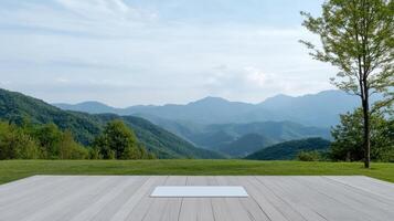 A wooden floor with a view of mountains photo