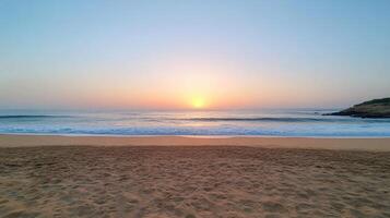 Sunset at the beach in goa, india photo