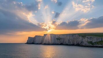 Sunset over the cliffs at east dorset photo