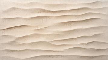 A wall with sand texture and a few waves photo