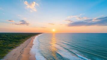 Aerial view of the sunset on the beach in the tropical rainforest photo
