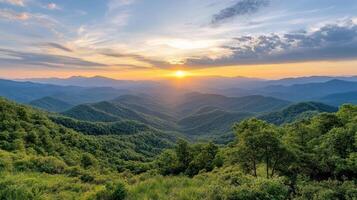The sun sets over the mountains in the great smoky mountains national park photo