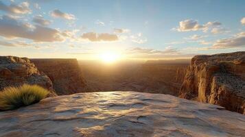 The sun is setting over the grand canyon photo