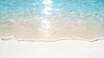 A sandy beach with water and sun shining on it photo