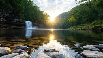 A waterfall in the woods with the sun shining photo