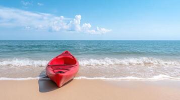 A red kayak on the beach photo