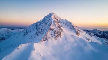 A mountain peak is seen in the distance at sunset photo