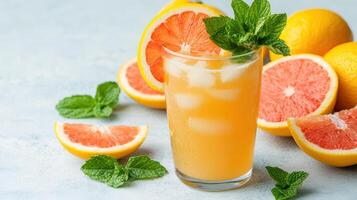 Grapefruit juice with mint leaves photo