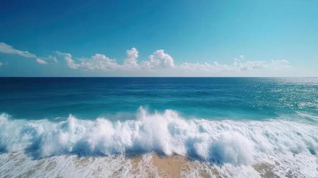 Aerial view of the ocean waves crashing on the beach photo