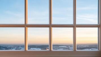A window with a view of the sunset photo
