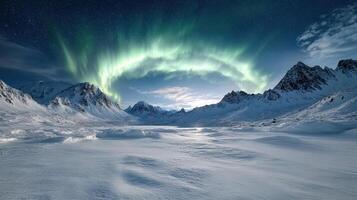The aurora borealis over the mountains photo