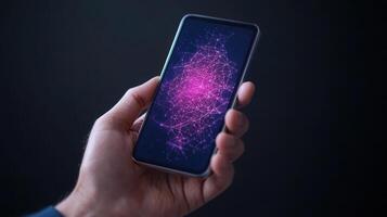 Hand holding smartphone with network graph on dark background photo