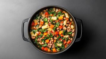 A pan filled with vegetables and beans photo